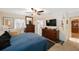 The main bedroom is spacious with a ceiling fan and plenty of closet space at 4701 Lodestone Dr, Tampa, FL 33615