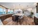 Modern kitchen with a large island, pendant lighting, and stainless steel appliances at 335 Bath Club S Blvd, North Redington Beach, FL 33708