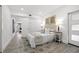 Neutral bedroom with tiled floors and a gray rug at 4210 Harrisburg Ne St, St Petersburg, FL 33703