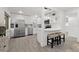 Beautiful kitchen with stainless steel appliances, and sleek white cabinets and countertops at 4210 Harrisburg Ne St, St Petersburg, FL 33703