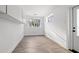 Bright room features tile flooring, natural light, and white built-in cabinets at 4210 Harrisburg Ne St, St Petersburg, FL 33703