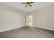 Bedroom with neutral paint, plush carpeting, and standard closet at 5811 Arbor Wood Ct, Bradenton, FL 34203