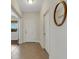 Welcoming foyer with tile flooring and views into the adjacent rooms at 5811 Arbor Wood Ct, Bradenton, FL 34203