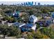 Aerial view of a neighborhood with the city skyline in the background at 818 W Adalee St, Tampa, FL 33603