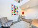 Stylish foyer with high ceilings, modern art, and a comfortable chair at 818 W Adalee St, Tampa, FL 33603