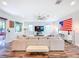 Bright living room featuring modern decor, wood floors, and comfortable seating at 818 W Adalee St, Tampa, FL 33603