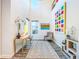 Bright living room with a desk, modern decor, high ceilings and a unique window at 818 W Adalee St, Tampa, FL 33603