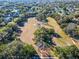Aerial view of a park with mature trees, walking paths, and open green space at 818 W Adalee St, Tampa, FL 33603