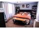 Cozy bedroom with natural light, comfortable bed, and ample storage space at 895 64Th S Ave, St Petersburg, FL 33705