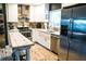 Well-equipped kitchen with stainless steel appliances and elegant countertops at 895 64Th S Ave, St Petersburg, FL 33705