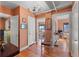 Inviting hallway with hardwood floors, chandelier, and openings to various rooms, creating an open and airy feel at 130 4Th N Ave # 414, St Petersburg, FL 33701