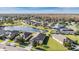 Aerial view of the community featuring homes surrounding a scenic pond at 19724 Post Island Loop, Land O Lakes, FL 34638