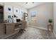 Cozy home office with custom built-ins, ample natural light, and a comfortable workspace at 19724 Post Island Loop, Land O Lakes, FL 34638