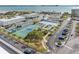 Aerial view of community amenities with tennis courts and waterfront view at 3010 59Th S St # 304, Gulfport, FL 33707