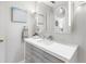 Bright bathroom featuring modern vanity with clean white countertop at 3010 59Th S St # 304, Gulfport, FL 33707