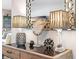 Decorated console table with decorative lamps and metallic sculptural items at 3010 59Th S St # 304, Gulfport, FL 33707