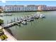 Aerial view of the marina with boats docked on the waterfront, offering convenient access to the bay at 3010 59Th S St # 304, Gulfport, FL 33707