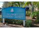 Gulfport Waterfront District sign surrounded by vibrant greenery at 3010 59Th S St # 304, Gulfport, FL 33707