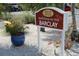 Welcome to The Barclay sign with lush landscaping and charming details at 3010 59Th S St # 304, Gulfport, FL 33707
