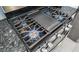 Gas stove top with granite countertops at 3010 59Th S St # 304, Gulfport, FL 33707