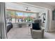 Cozy sunroom with neutral tones, comfortable seating, and large windows offering outdoor views at 3010 59Th S St # 304, Gulfport, FL 33707