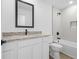 Clean bathroom with a granite sink countertop, and a shower/tub at 3378 Escobar Ln, North Port, FL 34286