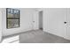 Carpeted bedroom with a window and view of a closet at 3378 Escobar Ln, North Port, FL 34286