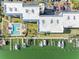Aerial view of waterfront condos with pool, boat docks at 363 Pinellas Bayway S # 41, Tierra Verde, FL 33715