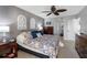 Bedroom with neutral walls, dark wood furniture, and a doorway leading to the closet at 363 Pinellas Bayway S # 41, St Petersburg, FL 33715