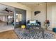 Inviting patio area with comfortable seating, stylish rug, and access to interior space at 363 Pinellas Bayway S # 41, Tierra Verde, FL 33715