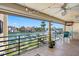 Relaxing balcony offering waterfront views, comfortable seating, and an outdoor television at 363 Pinellas Bayway S # 41, Tierra Verde, FL 33715