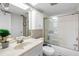 Bright bathroom with shower-tub and mirrored vanity at 363 Pinellas Bayway S # 41, Tierra Verde, FL 33715