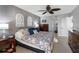 Cozy bedroom featuring a decorative wall design, plush bedding, and ample closet space at 363 Pinellas Bayway S # 41, Tierra Verde, FL 33715