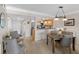 Inviting dining area that connects to the kitchen, complemented by tile flooring and natural light at 363 Pinellas Bayway S # 41, Tierra Verde, FL 33715