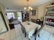 Cozy dining area open to the living room and access to the outdoor space at 3722 Haven Dr, New Port Richey, FL 34652