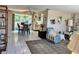 Open-concept living area with a dining area and adjacent kitchen, all bathed in sunlight at 3722 Haven Dr, New Port Richey, FL 34652