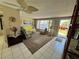 Inviting living room with a comfortable seating arrangement and bright entryway at 3722 Haven Dr, New Port Richey, FL 34652