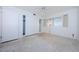 Bedroom with ceiling fan, natural light, and closet offers comfort and functionality at 4154 57Th N St # 173, Kenneth City, FL 33709