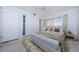 Cozy bedroom featuring a comfortable bed, neutral tones, and ample closet space at 4154 57Th N St # 173, Kenneth City, FL 33709