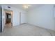 Cozy bedroom with closet and terrazzo flooring, offering a calm and inviting private space at 4154 57Th N St # 173, Kenneth City, FL 33709