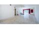 Spacious living room with terrazzo flooring and a ceiling fan at 4154 57Th N St # 173, Kenneth City, FL 33709