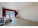 Unfurnished living room showing terrazzo floors and natural light at 4154 57Th N St # 173, Kenneth City, FL 33709