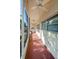 Long covered patio with ceiling fans and screened in area at 4154 57Th N St # 173, Kenneth City, FL 33709
