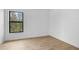 Bedroom showcasing a window with views of lush, natural Florida landscape at 5237 Aberback St, North Port, FL 34291