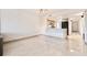 Spacious open floor plan with tile flooring and an updated kitchen and bath at 5400 Park N St # 209, St Petersburg, FL 33709