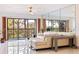Living room featuring a white sectional with balcony access and view at 5400 Park N St # 209, St Petersburg, FL 33709