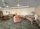 This is the community lounge with several sofas and chairs at 5400 Park N St # 209, St Petersburg, FL 33709