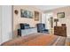 Comfortable bedroom featuring warm tones, closet space, and traditional decor at 90 S Highland Ave # 423, Tarpon Springs, FL 34689