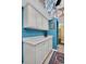 Bright kitchen featuring white cabinets, countertops, and a stunning stained-glass skylight at 90 S Highland Ave # 423, Tarpon Springs, FL 34689