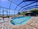 Enjoy this screened in pool with brick pavers and views of the lake at 11525 Lake Lucaya Dr, Riverview, FL 33579